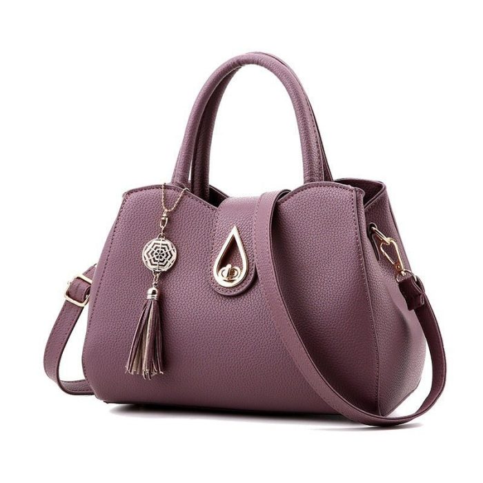 womens-modern-fashion-leather-handbag-793944.jpg